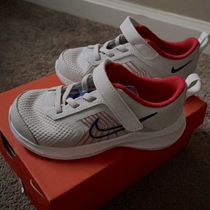 Brand New Nike kids sneakers. Size 10C.